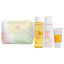 Clarins Cleansing Essentiels Set - Normal to Dry Skin 6.7oz Velvet Cleansing - Milk, 6.7oz Hydrating Toning Lotion, 0.4oz Comfort Scrub, Beauty Purse Women 4 Pc