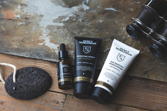 Percy Nobleman Age Defence Kit, a men's skincare set containing Charcoal Face Scrub (with Natural AHAs), ultra-hydrating Facial Serum (with Hyaluronic Acid), and Moisturiser (with Vitamin C)